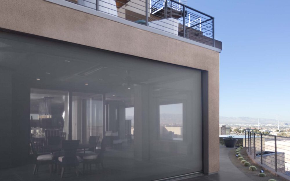 Keep the bugs out, and the fresh air in, with Phantom's motorized screens for porches & patios 