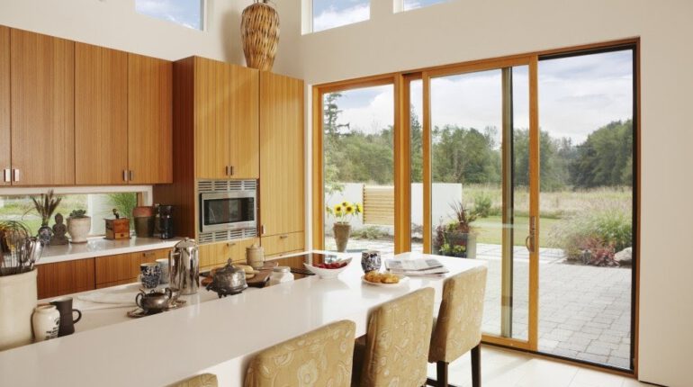 Wooden kitchen with disappearing single door screens